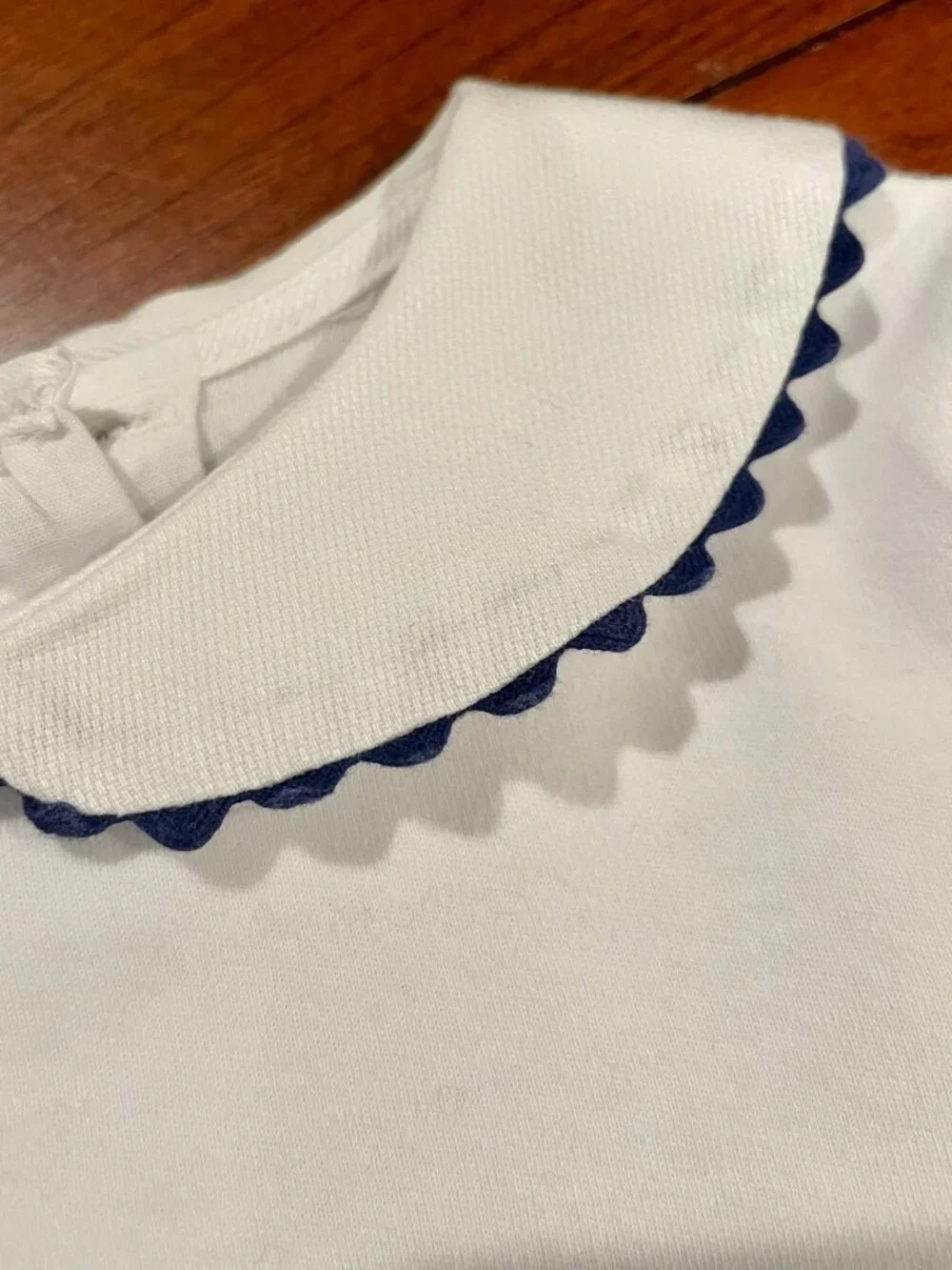 Girls White Peter Pan Collar shirt with Navy Ric Rac Trim - Sz 24 mo.